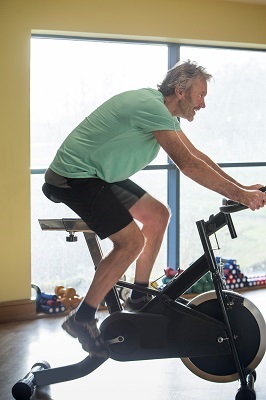 Man riding Indoor cycle
